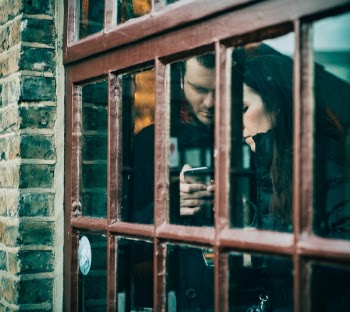 Free Photo of window, glass, couple