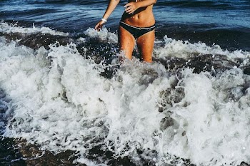 Free Photo of woman, bikini, splashing