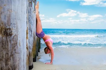 Free Photo of woman, handstand, beach