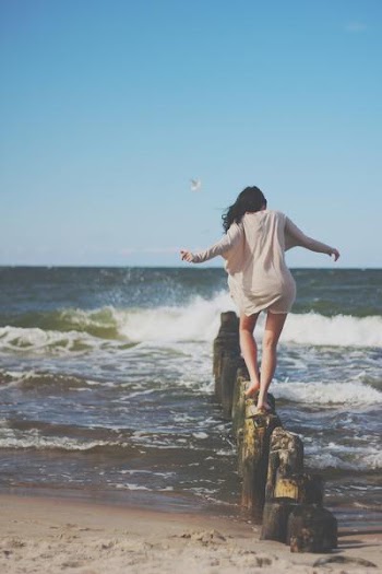 Free Photo of woman, stepping, ocean