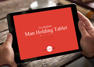 Free Realistic Man Holding Tablet Mockup free realistic man holding tablet 