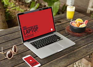 Free Smartphone With Laptop Mockup Placing on Wooden Table free smartphone with laptop 