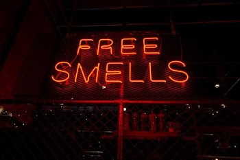 Free Smells neon signage