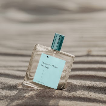 Free Transparent Bottle on Sunny Beach Mockup