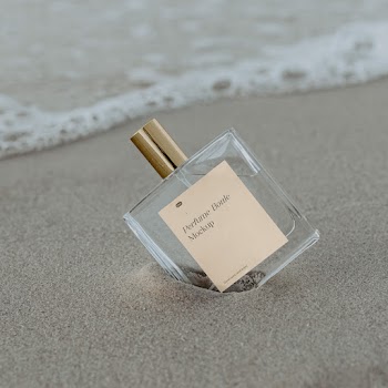Free Transparent Bottle with Label Mockup
