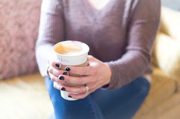 Free woman grabbing coffee cup | Free Photo - rawpixel