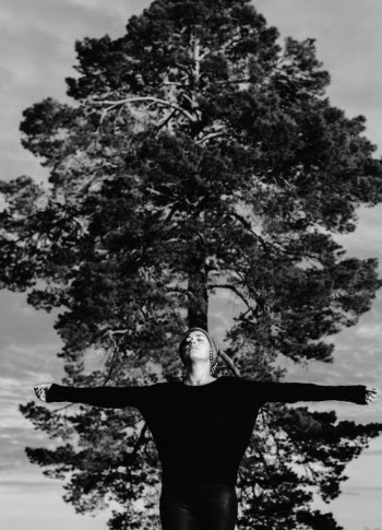 Free woman near tree in forest · Free Stock Photo