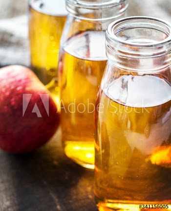 Fresh apple juice close up shot