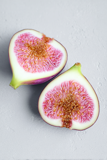 Fresh Halved Fig on Gray Background