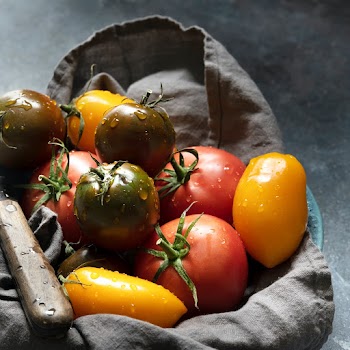 Fresh tomatoes vegetable in a sack flat lay