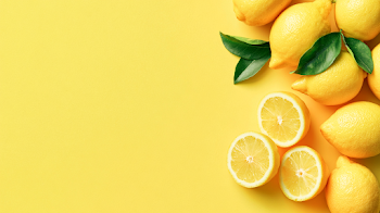 Fresh Yellow Lemons on Monochrome Yellow Background