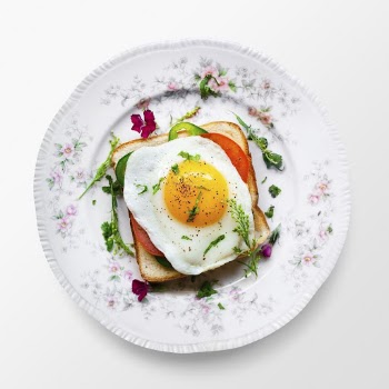 Fried egg toast on a plate, | Free PSD - rawpixel