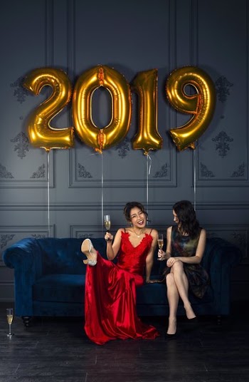 Friends Celebrate New Year's Eve With Champagne