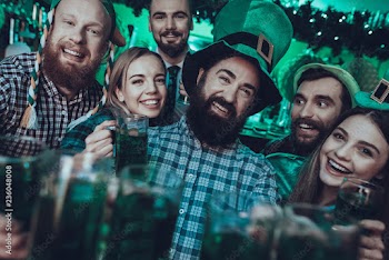 Friends celebrating a Saint Patrick's Day at pub