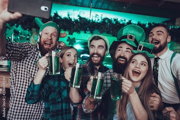 Friends doing selfie at Saint Patrick's Day at pub