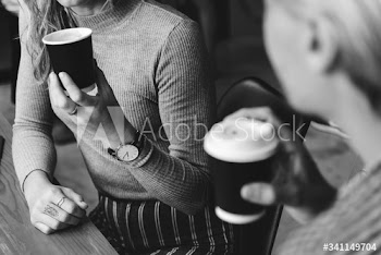 Friends enjoying a hot coffee together