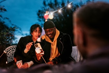 Friends enjoying s'mores and marshmellow | Free Photo - rawpixel