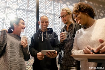 Friends looking at a smartphone
