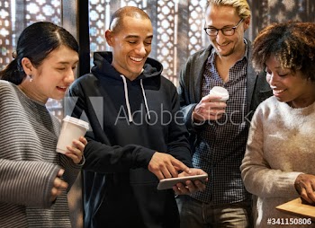 Friends looking at a smartphone