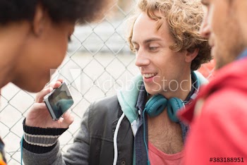 Friends using smart phone