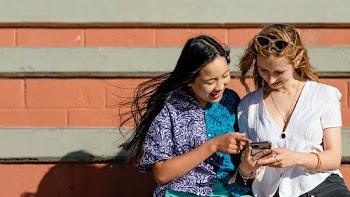 Friends watching viral content, social media… | Free stock photo | High Resolution image