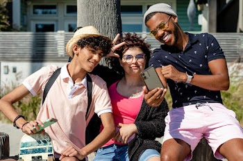 Friends watching viral videos, social media… | Free stock photo | High Resolution image