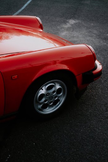 Front Part of Red Vintage Car · Free Stock Photo