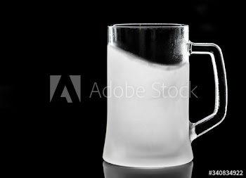 Frosted empty beer glass macro photography