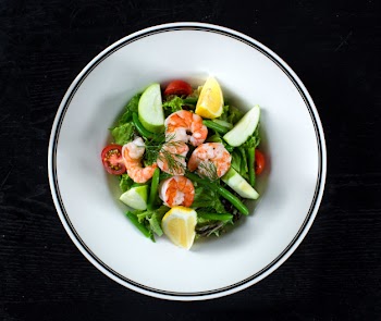 Fruit and vegetable salad with shrimp and asparagus Free Photo