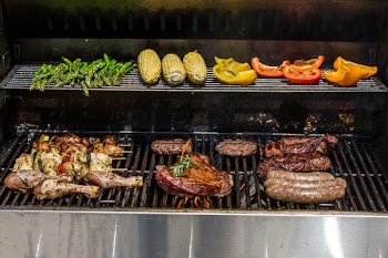 Full Grill Full Of Meat And Veggies