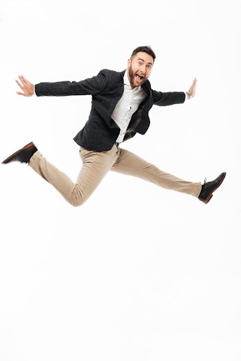 Full length portrait of a cheery happy man Free Photo
