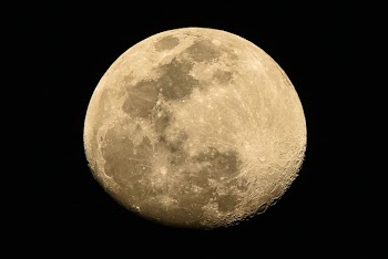 Full Moon Over a Dark Night Sky