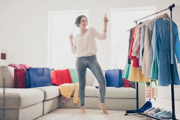 Full size photo of happy funky woman dance good mood wardrobe buy clothes good mood indoors inside house living room