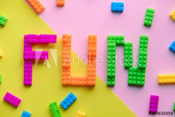 Fun spelled word with plastic blocks background