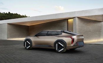 Futuristic Electric SUV in Modern Architectural Setting