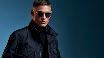 Futuristic Luxury Men's Fashion Model in Studio Setting