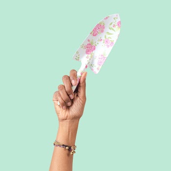 Gardening tool shovel in floral pattern | Free stock photo | High Resolution image