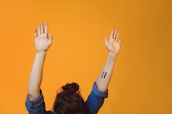 Genderqueer Pride Flag Painted On Arm