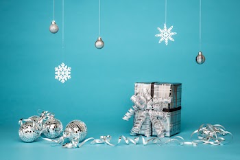 Gift Box Surrounded By Grey Baubles 