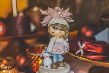 Girl and Penguin Figurine