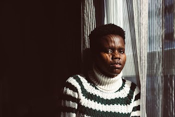 Girl Beside the Window Curtain