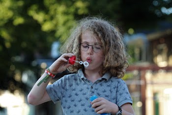 Girl Blowing Bubbles