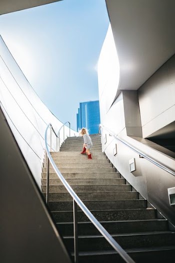 girl climbing on stair