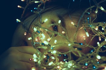 Girl Facing Turned on String Light