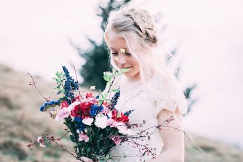 girl holding bouquet of flowers