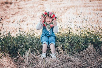 Girl Holding Flower Crown