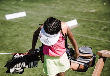 Girl Holding Golf Bag