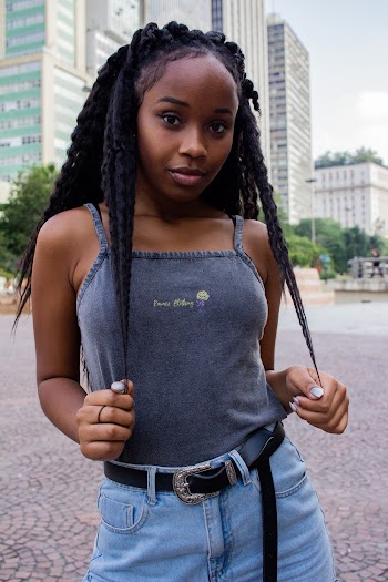 Girl Holding Her Braided Hair