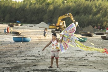 Girl Holding Kite 