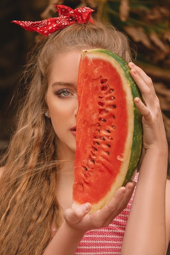 Girl Holding Sliced Watermelon